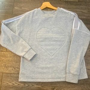 Junior Girls sweatshirt with heart design. Size M